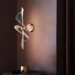 Discover Luminance Among Celestial Waves, a luxury pendant lamp inspired by flowing celestial forms. Elevate your space with its elegant curves and warm, ambient glow.