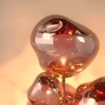 Luxury modern floor lamp with rose gold glass orbs – artistic designer lighting fixture for contemporary interiors, ambient glow decor piece for living room or hotel lobby.