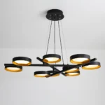 High-end geometric black and brass chandelier, luxury modern dining room light.