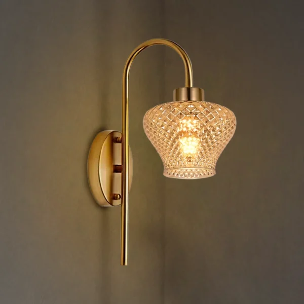 Lyra Glimmer Modern Golden Finish Wall Lamp with a diamond-cut glass shade and brass frame.